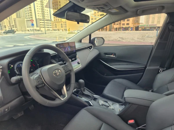 White Toyota Corolla Hybrid Photo 