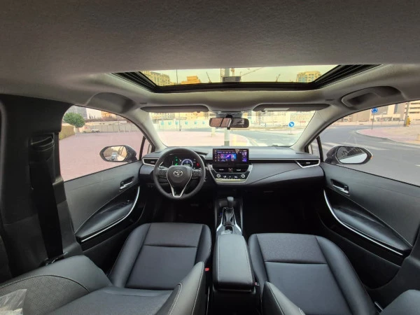  White Toyota Corolla Hybrid Photo 