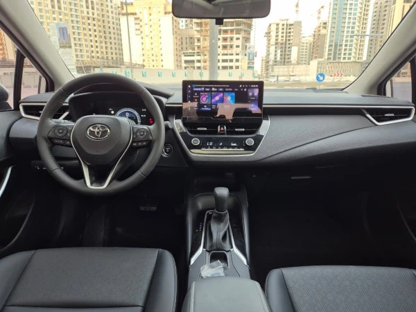  White Toyota Corolla Hybrid Photo 