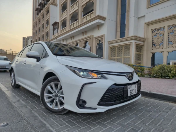  White Toyota Corolla Hybrid Photo 
